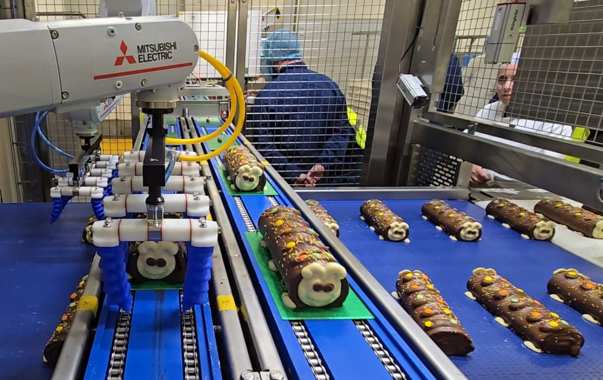 Caterpillar cakes on conveyors